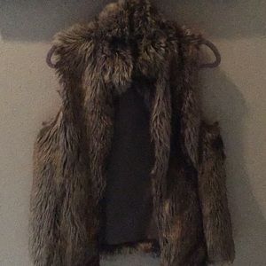 A coat that has a wolf fur